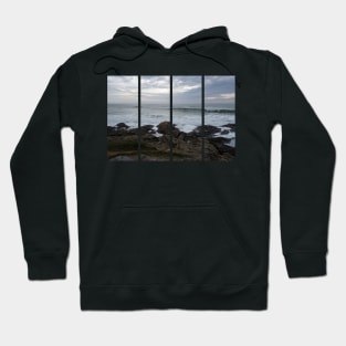 Atlantic coast. Rough sea and big waves on the rocks. Cloudy winter afternoon. Hoodie